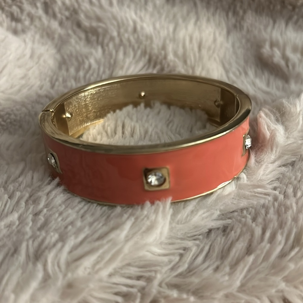 Elegant Gold and Coral Bracelet